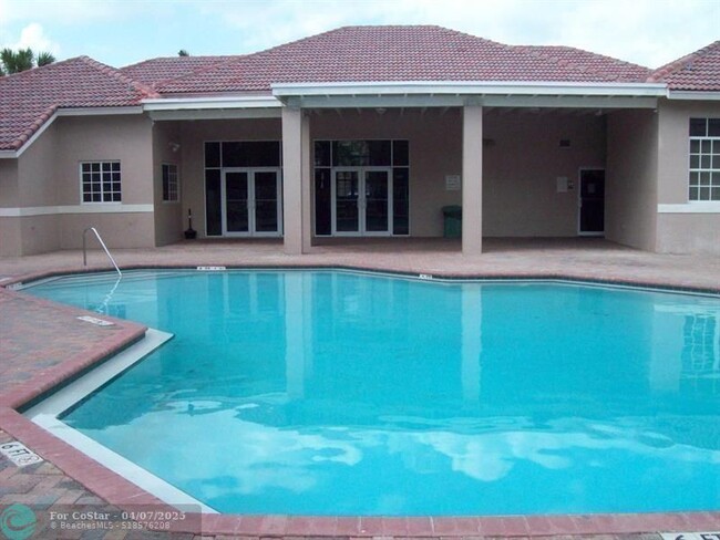 Building Photo - 3241 Sabal Palm Manor