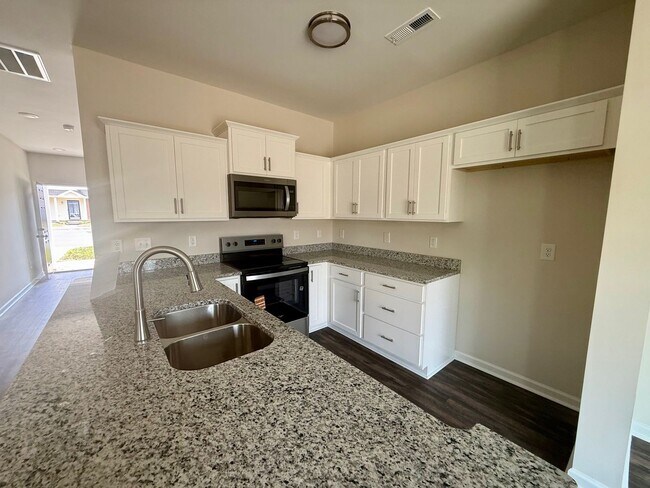 Building Photo - Two bedroom, 2.5 bath townhome in Ridge Creek, Whitsett-Save $1050!