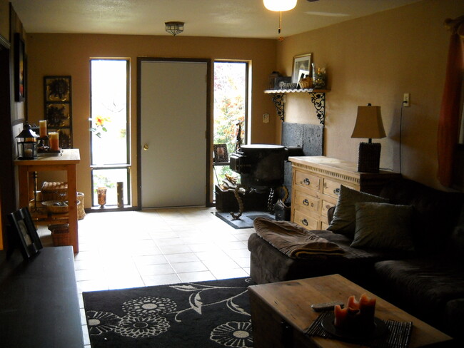 Decorated living area (wood stove now replaced w/ pellet stove) - 3333 Hamblen Ct