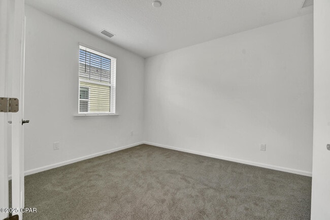 Building Photo - 8928 Parrot Pl