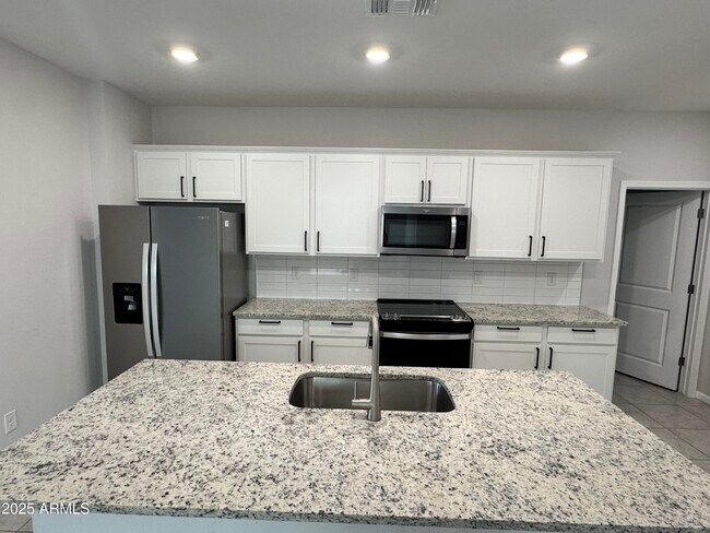 Building Photo - 18228 W Daley Ln