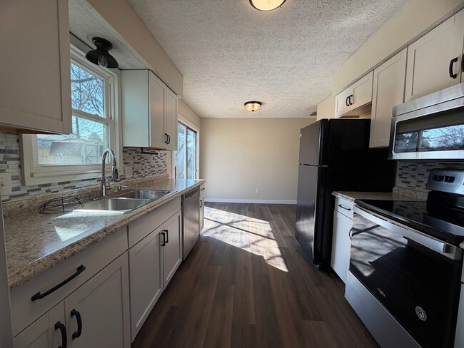 Building Photo - 3 Bedroom Home with Fenced Backyard & Storage Shed