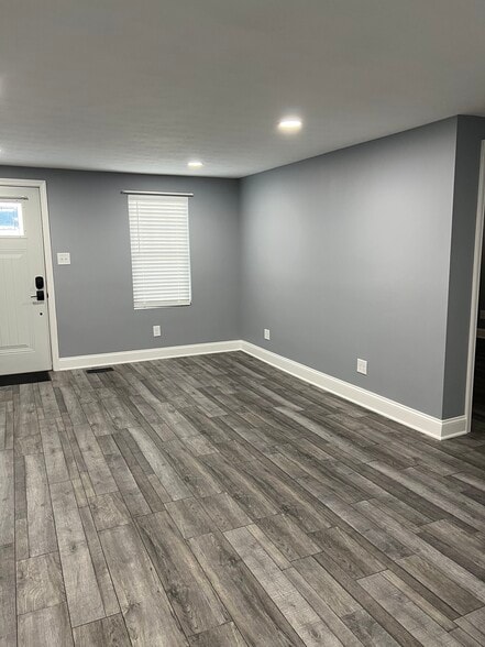 Vinyl plank flooring throughout. No carpet! - 1157 S Prairie St