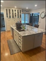 Shared kitchen with 2 islands steps from the 2 bedrooms! - 11032 Aquila Bluffs Cir