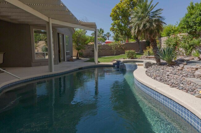 Building Photo - 38625 Desert Mirage Dr