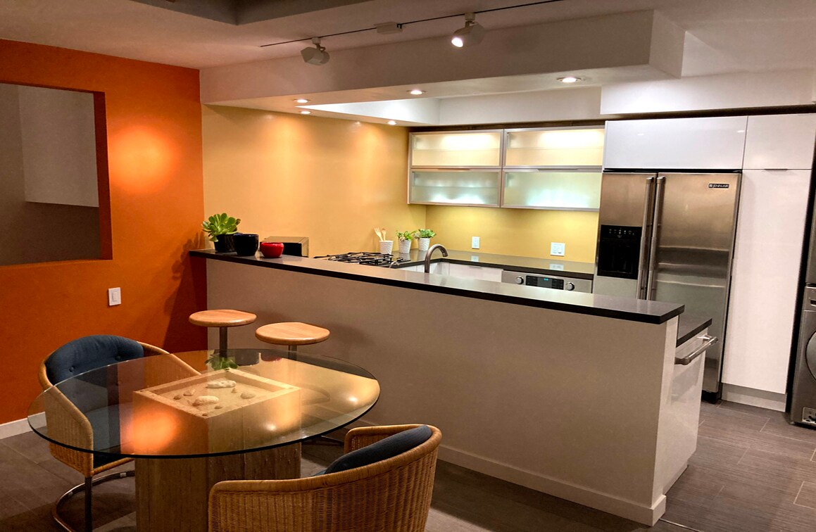 Dining Room Open Kitchen At Night - 8616 Wonderland Ave