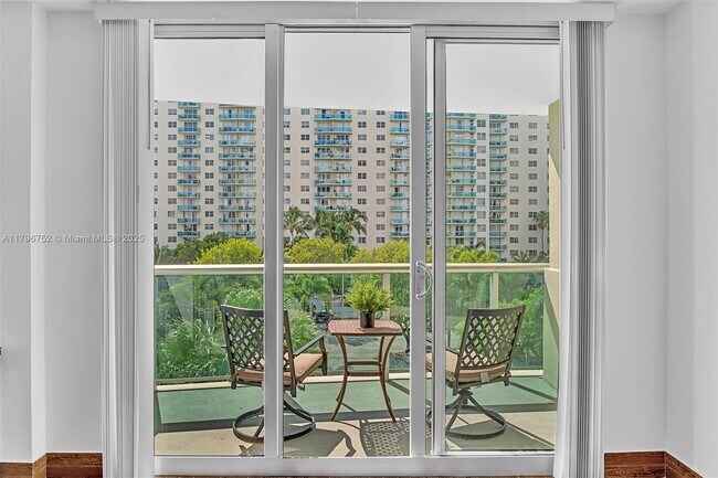 Building Photo - 19380 Collins Ave