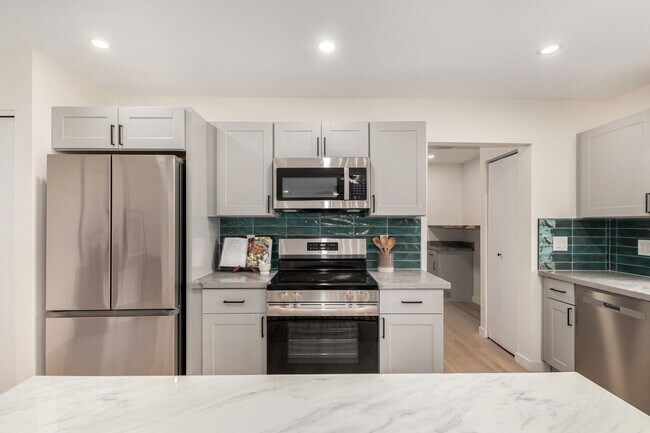 Building Photo - Fully Remodeled 4-Bedroom Home in Prime Gi...