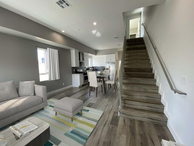 2nd Floor - Open Floorplan with Living Room, Dining Room, and Kitchen - 5747 Fulcher Ave