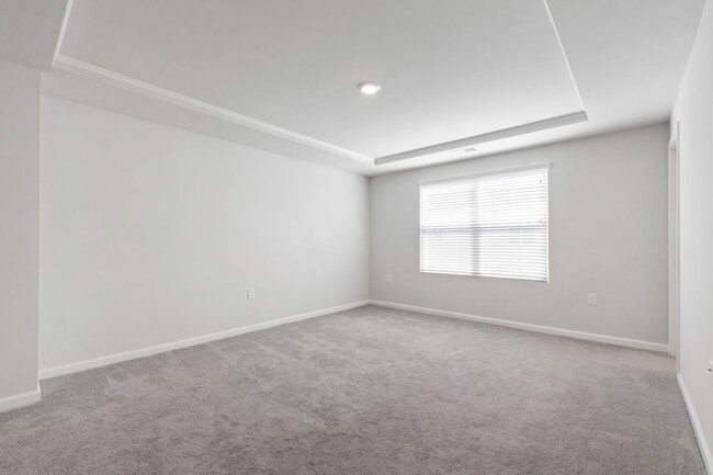 Building Photo - Bright, Spacious & Move-In Ready Townhome ...