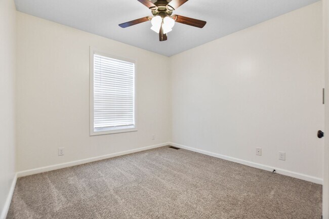 Building Photo - Pet Friendly Three Bedroom with Bonus!