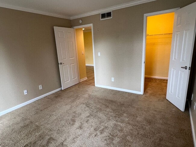 Building Photo - Magnificent 1 Bedroom Condo in Triana in Corona Ranch