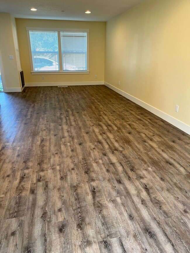 Building Photo - Remodeled Home with New Flooring, Quart Counters, W/D, Fenced Yard, Parking & MORE!