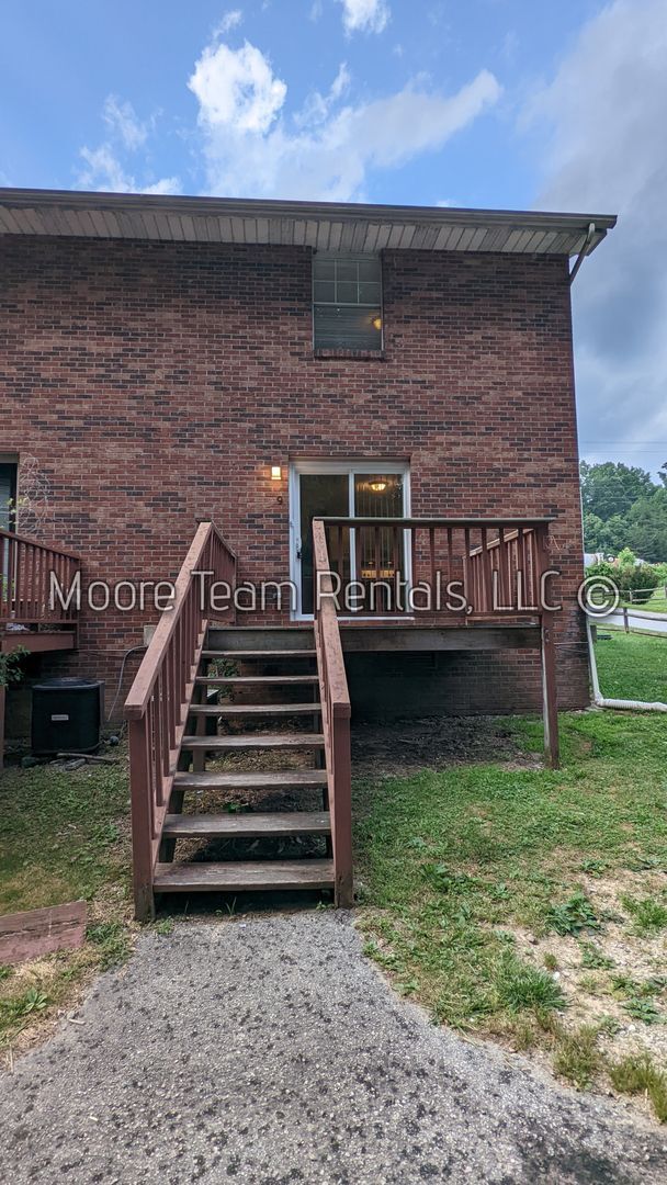 Building Photo - 2 Bed/1.5Ba - Includes - Water, Septic, Trash & Lawn Maint