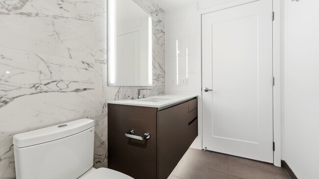 Building Photo - Luxury 1 Bed • 1 Bath at Spire Condominiums