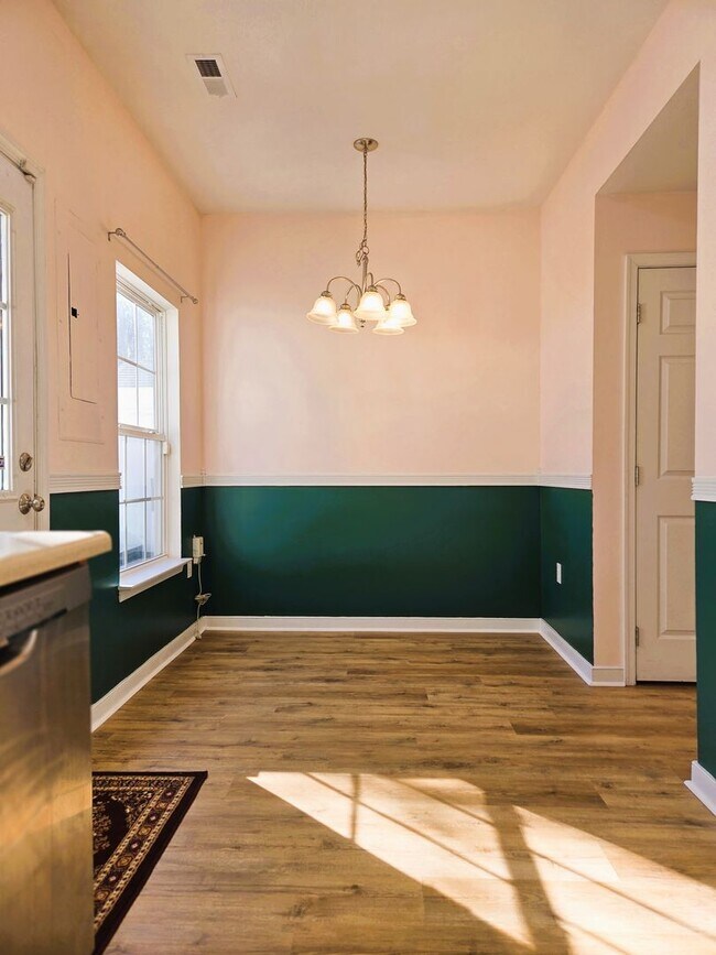 Building Photo - Ashley Village Townhome with all new LPV flooring and paint.