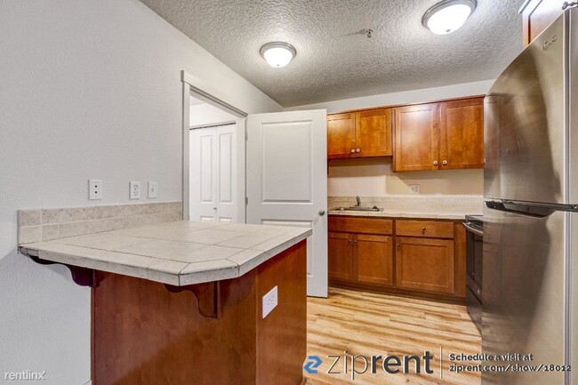 Building Photo - 1 br, 1 bath Condo - 11263 SE Causey Cir, ...