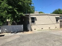 Building Photo - Home with Fenced Yards