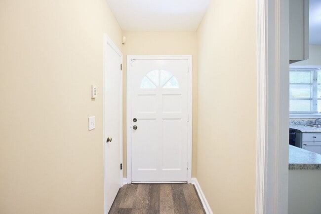 Building Photo - Vintage Charm with Modern Upgrades and Sunroom Living