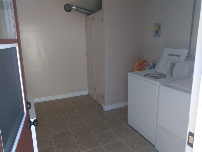 Newly Remodeled Common Laundry Room - 2215 Clark Ln