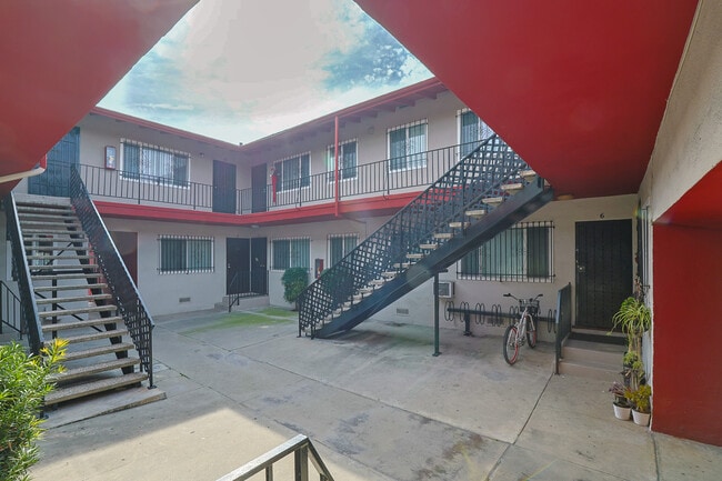 Building Photo - Paul Ling Apartments - Exposition