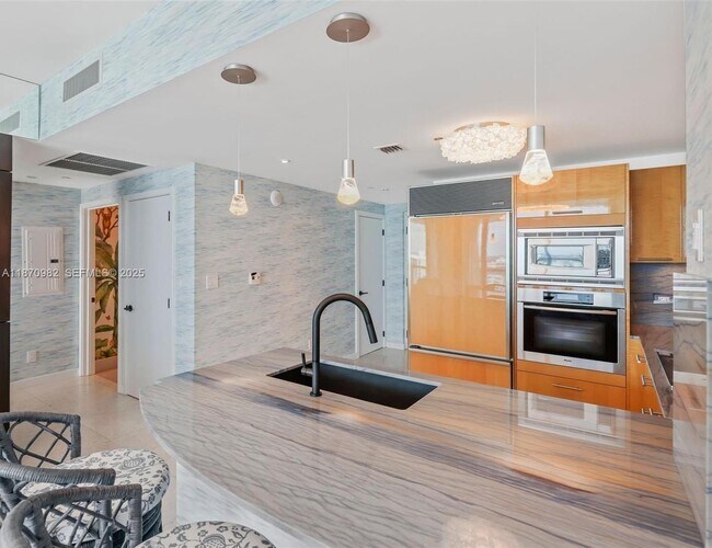 Building Photo - 6799 Collins Ave