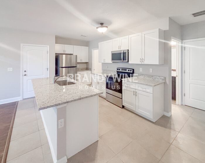 Building Photo - 12026 Suburban Sunrise St