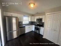 Building Photo - 801 E 120th Ave