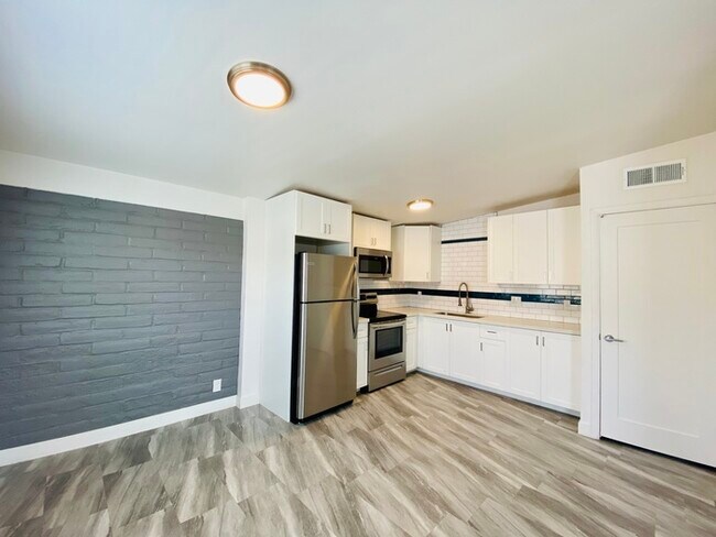 Building Photo - 1/2 Off Month Move In Special! Modern living in this completely remodeled 3 Bed/2Bath - Community...