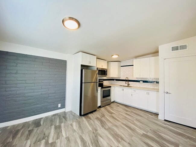 Building Photo - Modern living in this completely remodeled...