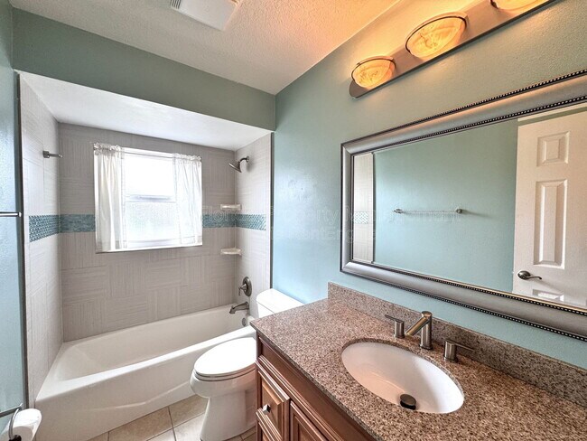 Building Photo - 4818 Breezy Palms Ct