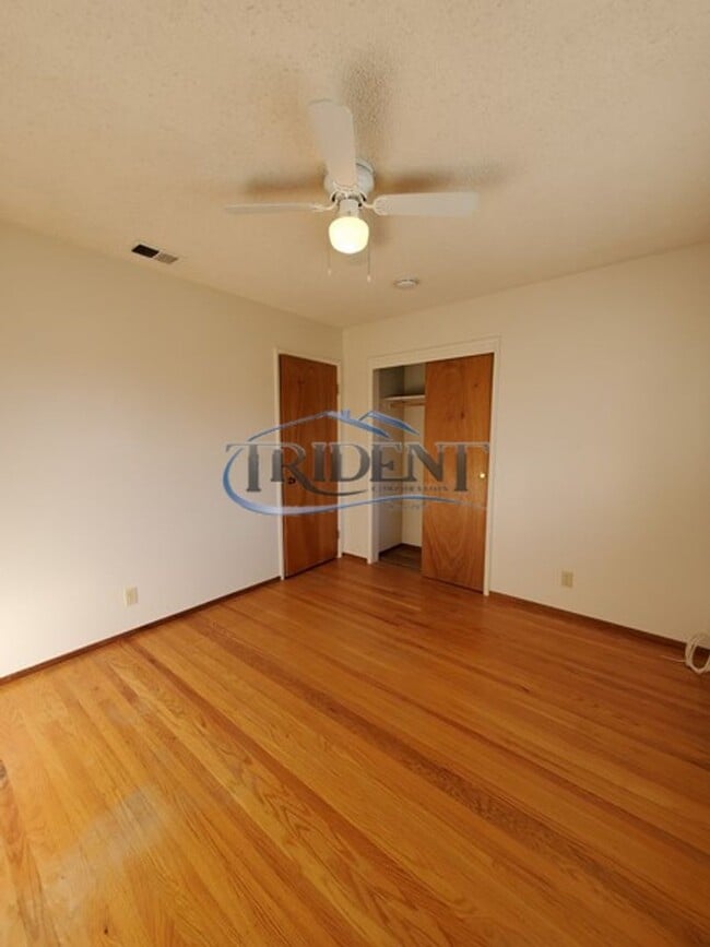 Building Photo - This is a cute 4 bedroom, 2 bath house in an established Woodland community