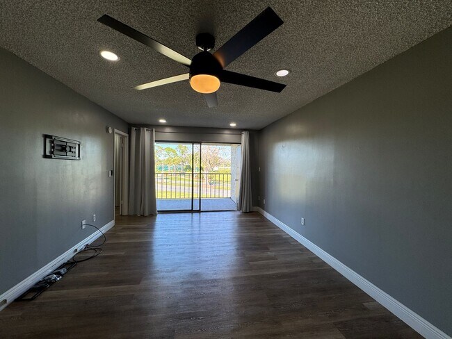 Building Photo - Spacious 2-Bedroom, 2-Bath Condo in Guard-...