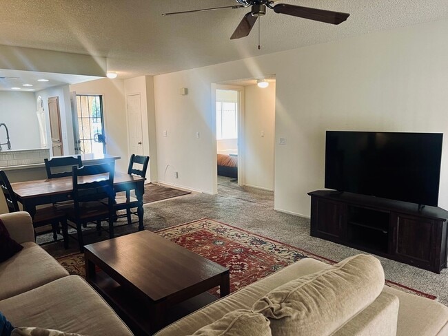 Building Photo - Affordable Comfort in 55+ Guard-Gated Comm...