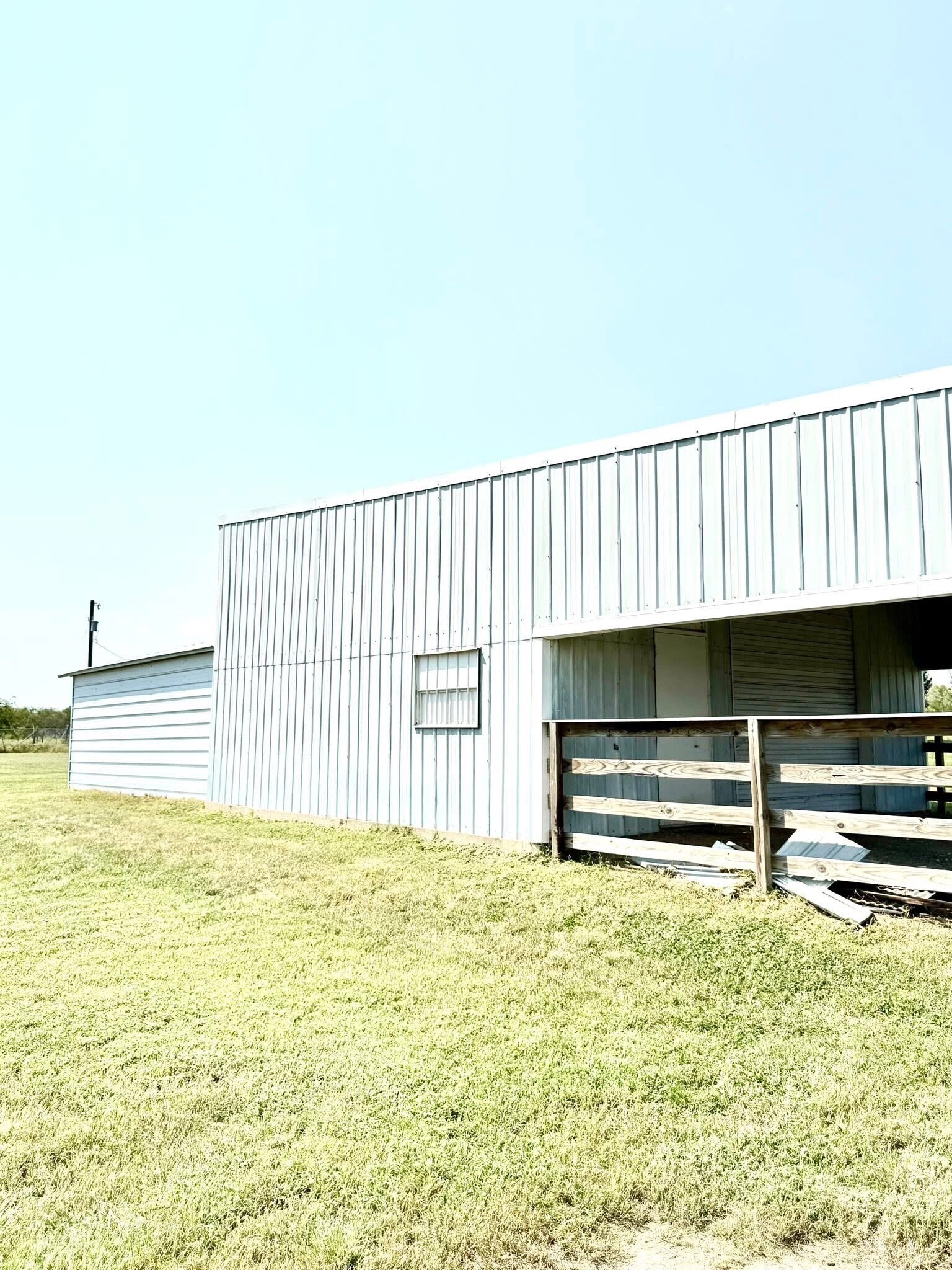Side of shop - 15693 State Highway 205