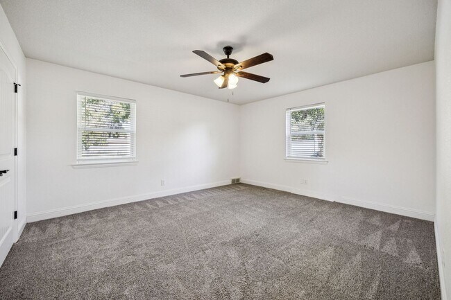 Building Photo - Stylish Renovation + Solar Savings in Prime Location