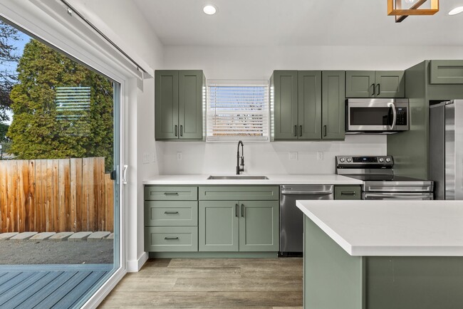 Building Photo - Brand new 2 bed/2 bath, central a/c, dishwasher, washer & dryer, deck & patio! March rent free!