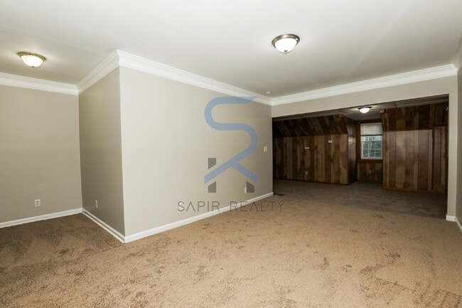 Building Photo - Move in before February 15th and choose your reward: a $250 Amazon Gift Card or a 55" Smart TV!