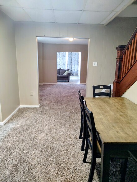 Dining Room-Living Room-Enclosed Sunroom - 1914 Manada St