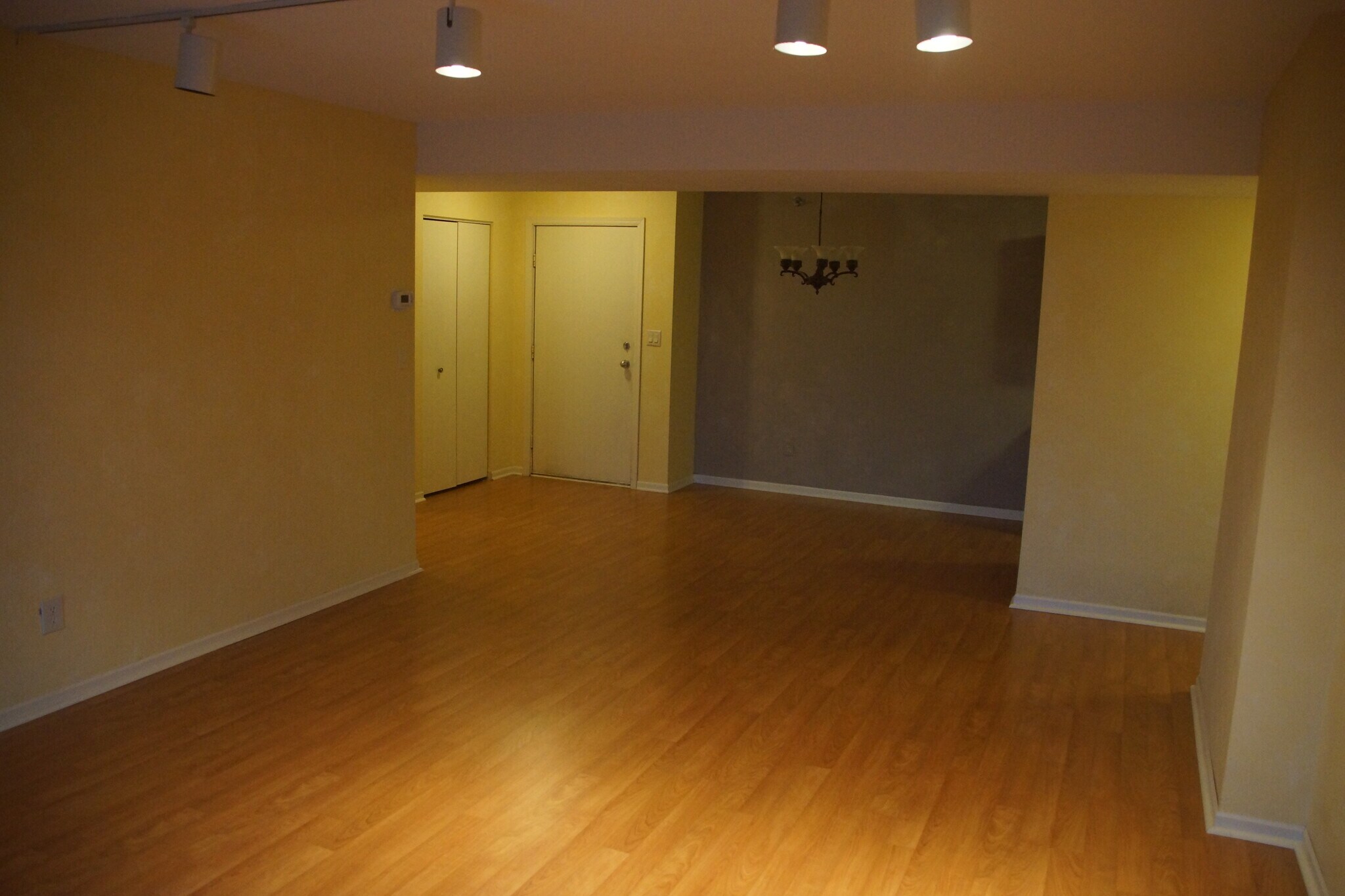 Dining area and front door from living room - 121 Washington Ave S