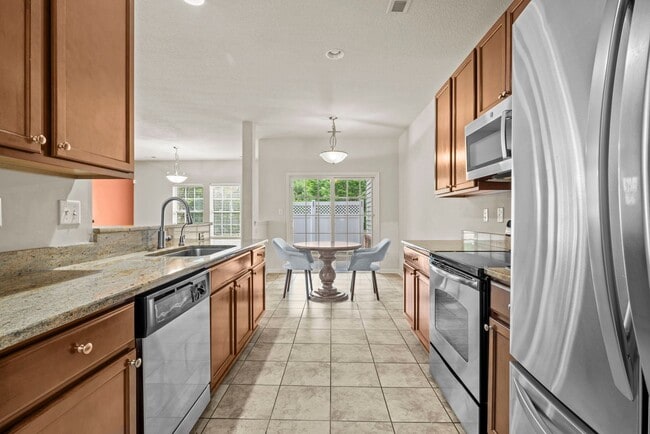 Building Photo - Beautifully Maintained 3-Bedroom Townhome with Bonus Room in Desirable Community