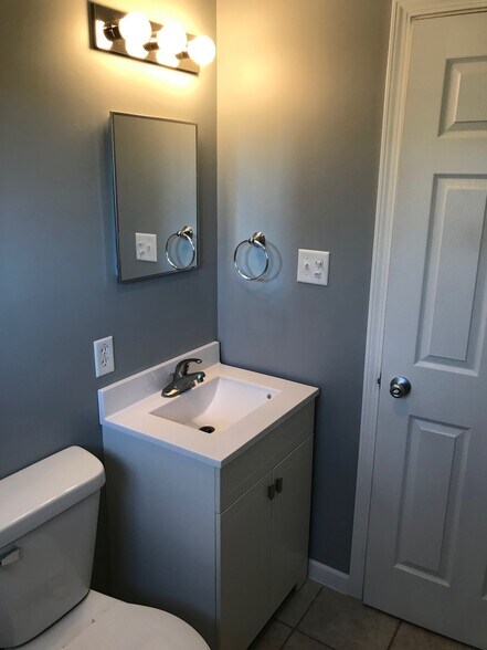 New vanity and toilet - 4204 Woodvale Dr