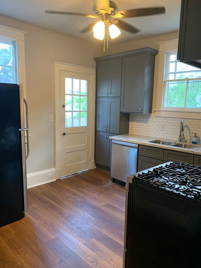 NEW kitchen with granite counters and stainless appliances - 1215 Foucher St