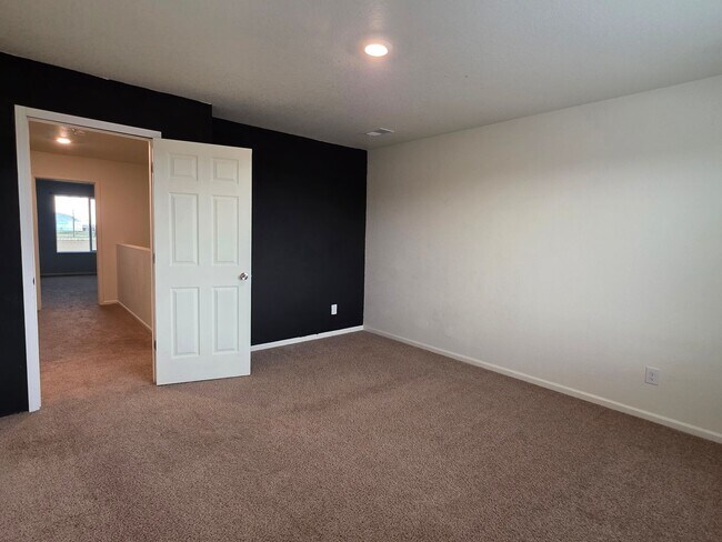 Building Photo - MASSIVE 5 Bedroom Home In Bennett!