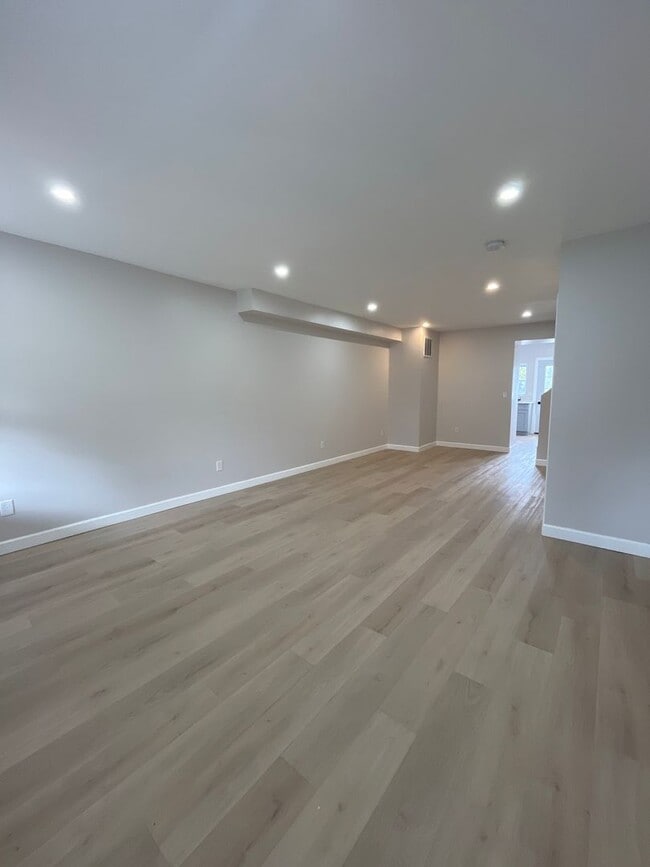 Building Photo - A real stunner! The full renovation is the first thing you'll notice..