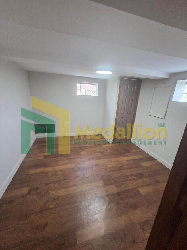 Building Photo - Spacious 6-Bedroom Home with Finished Basement and Backyard