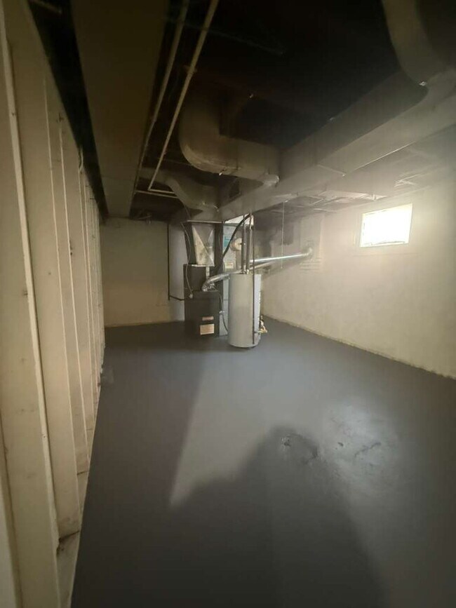 Building Photo - "Charming 2-Bedroom St. Louis Home with Gleaming Hardwood Floors in 63121!"