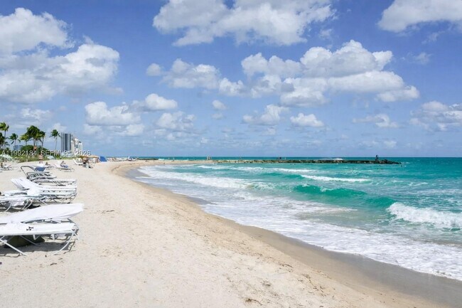 Building Photo - 10275 Collins Ave