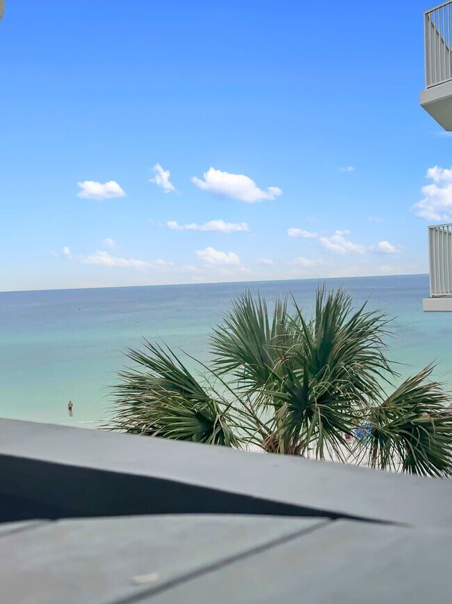 Building Photo - 50% off first months rent.  Gulf front com...