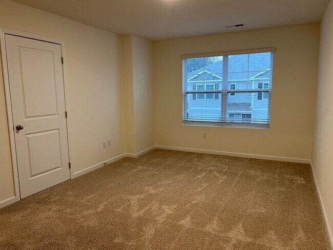 Building Photo - Beautiful New Construction 3 bedroom 2.5 Condo   with garage- Water, trash & sewer incuded!